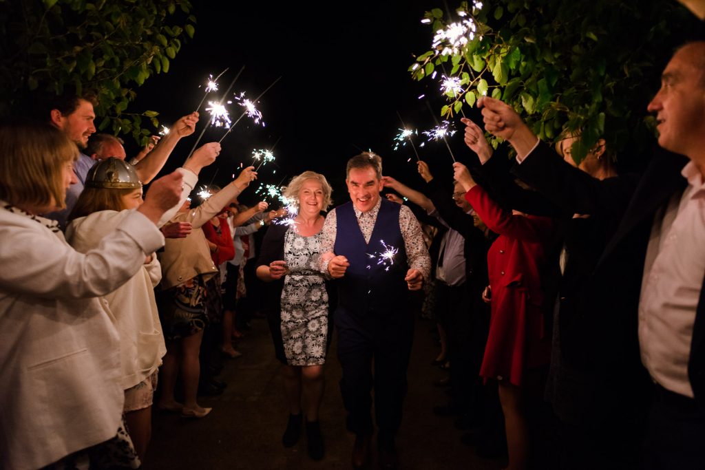 Sparkler exit at Back To The Garden Wedding captured by Norwich Wedding Photographer Andrew Kahumbu