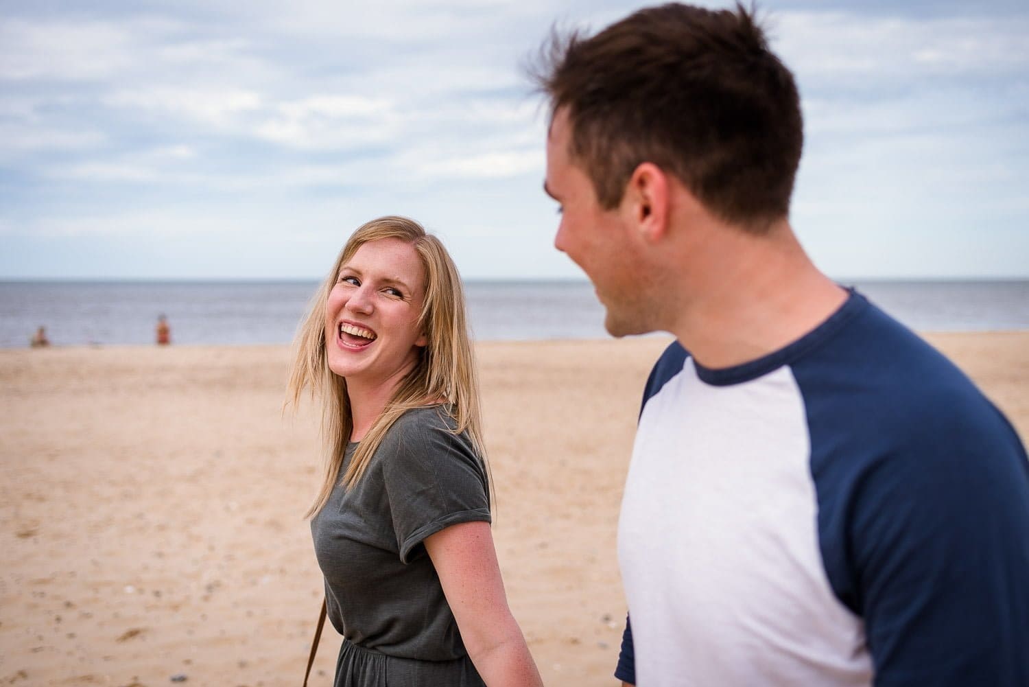 Smiling couple during their Norfolk Engagement photography session with Andrew Kahumbu